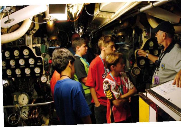 Volunteers conduct tours of the HMAS Ovens submarine at the Maritime Museum